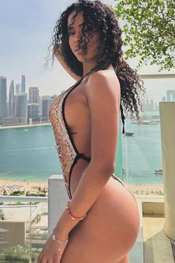 Curly Mulatto London Escort Conferra